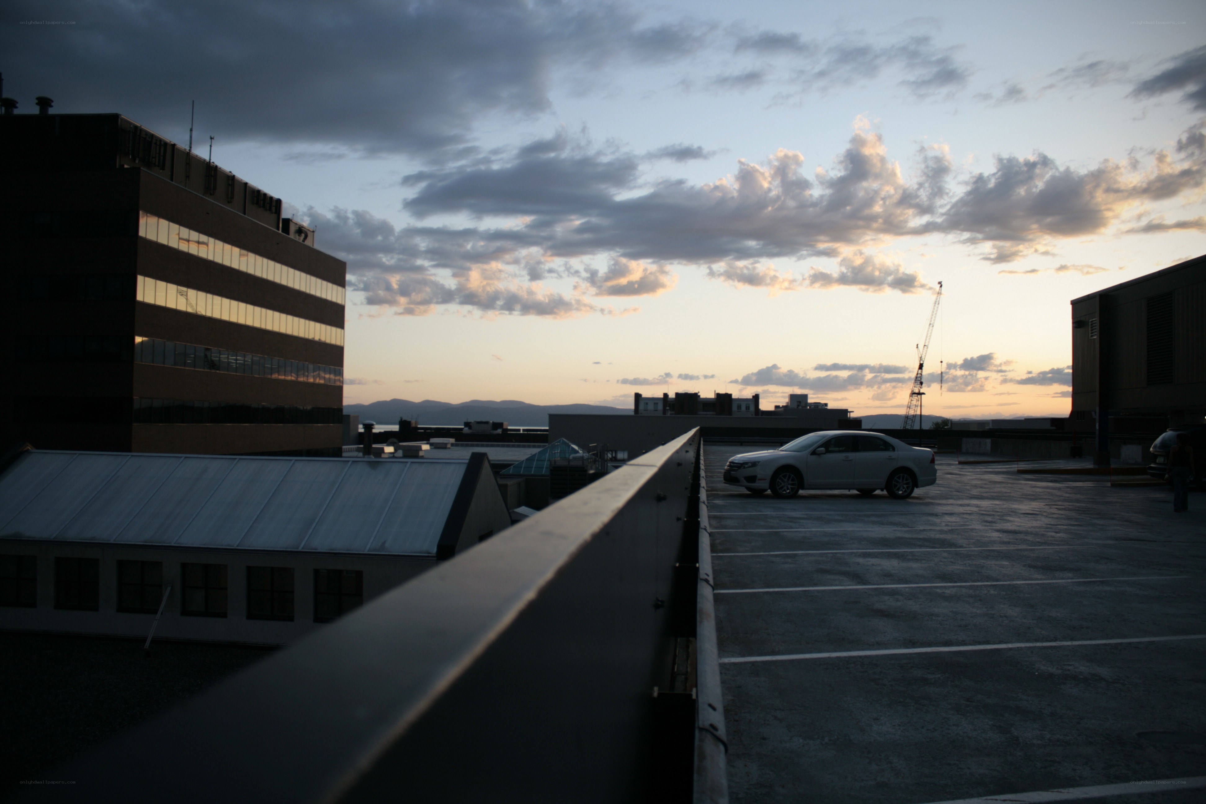 Rooftop parking at dusk