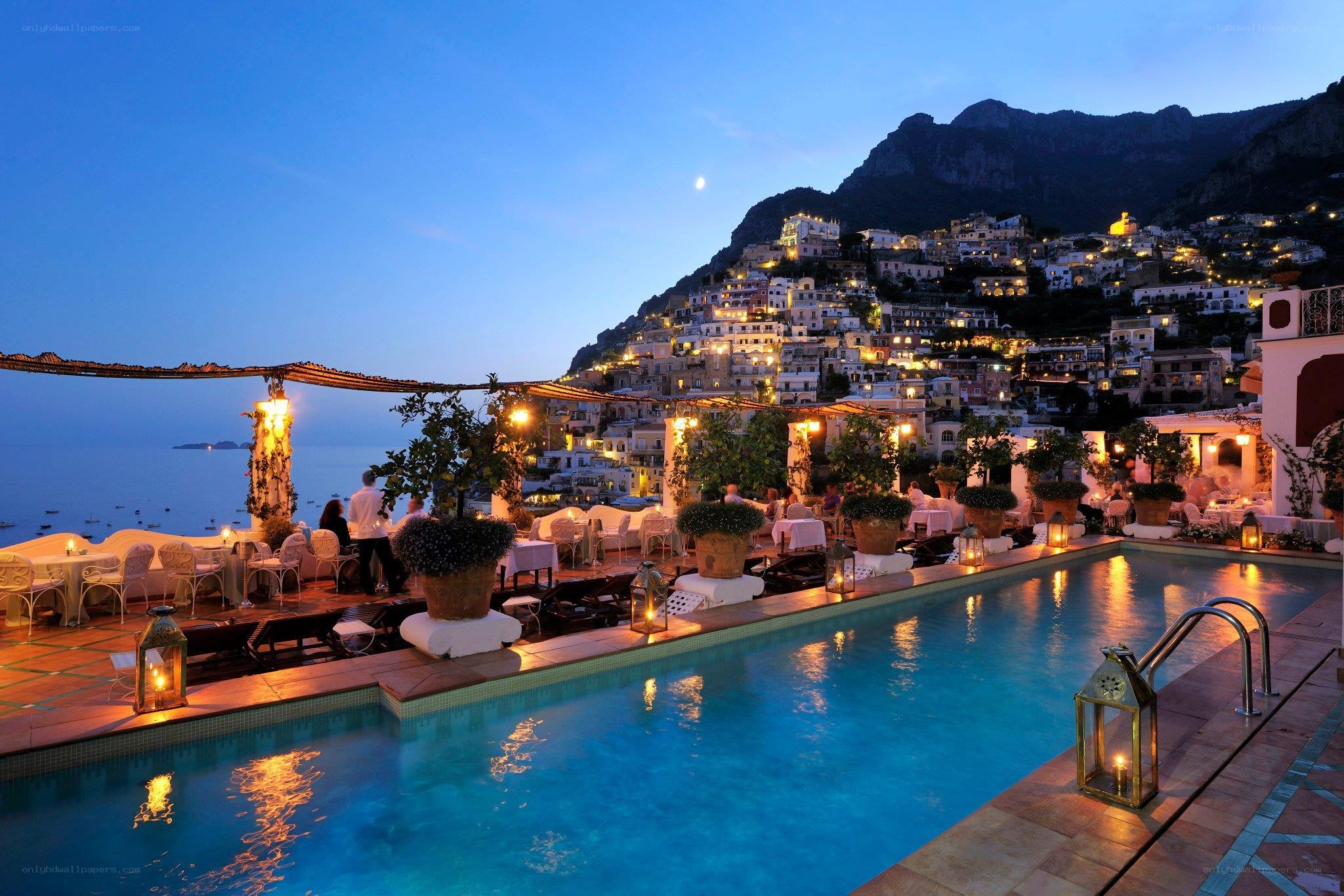 Rooftop pool at dusk in Amalfi