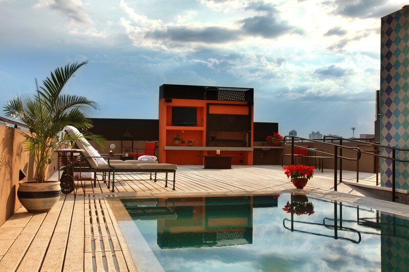 Rooftop pool with lounge area