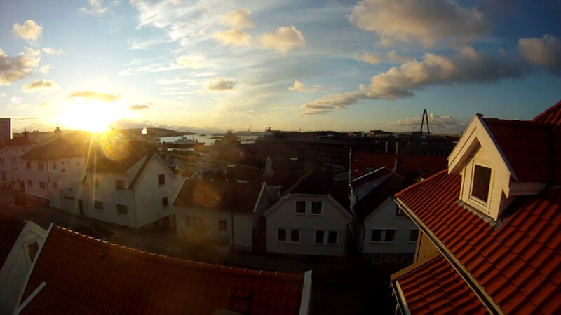 Rooftops at Sunset — Orange
