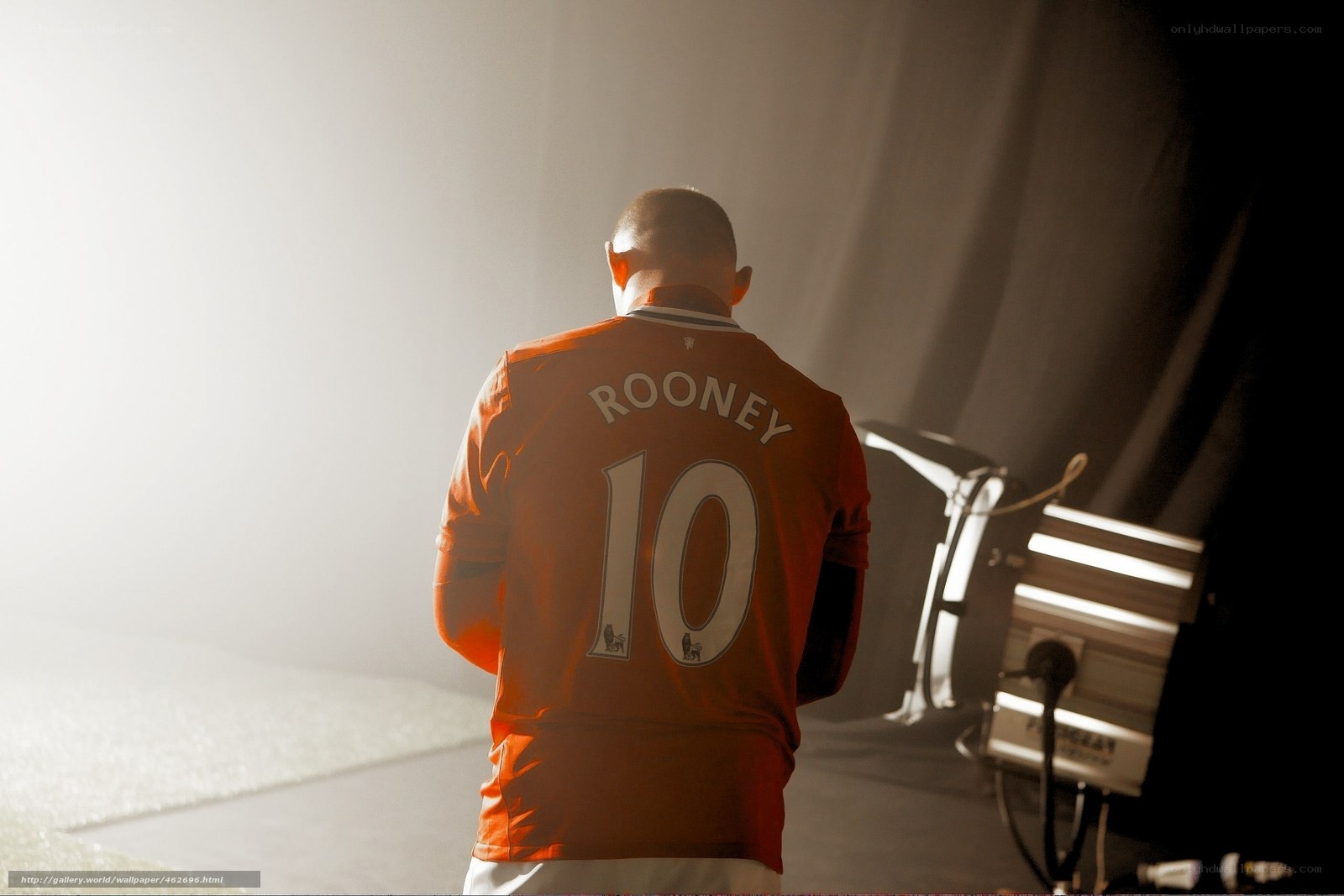Rooney in orange jersey