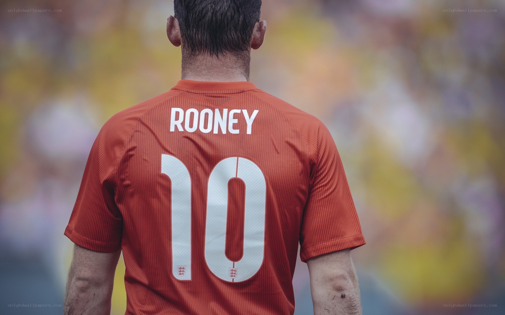 Rooney in orange jersey