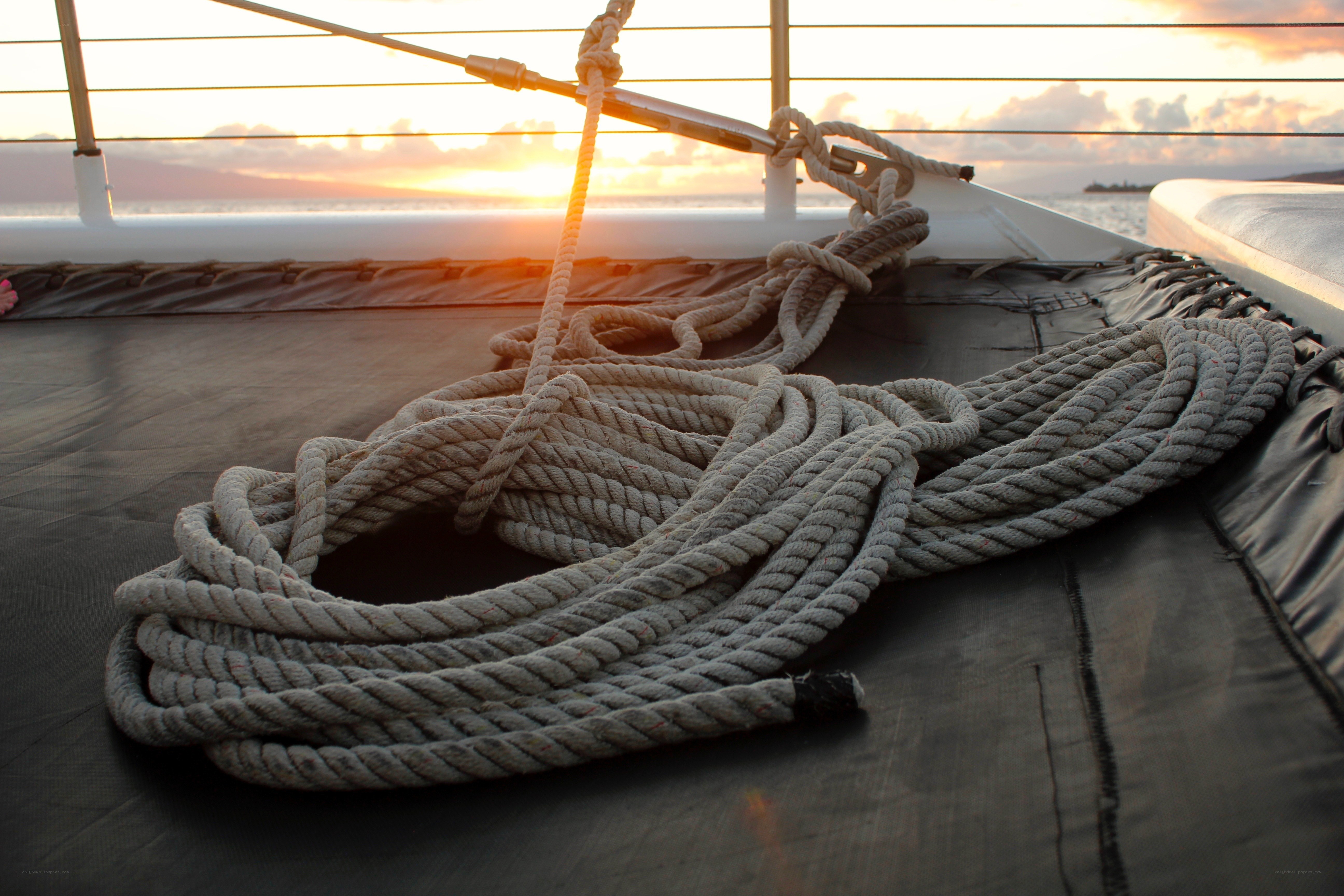 Rope on boat at sunset