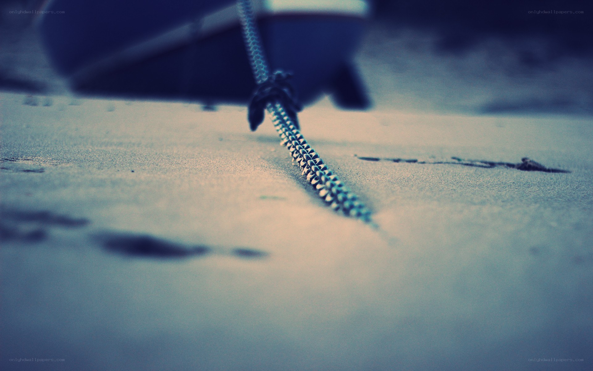 rope on sandy beach