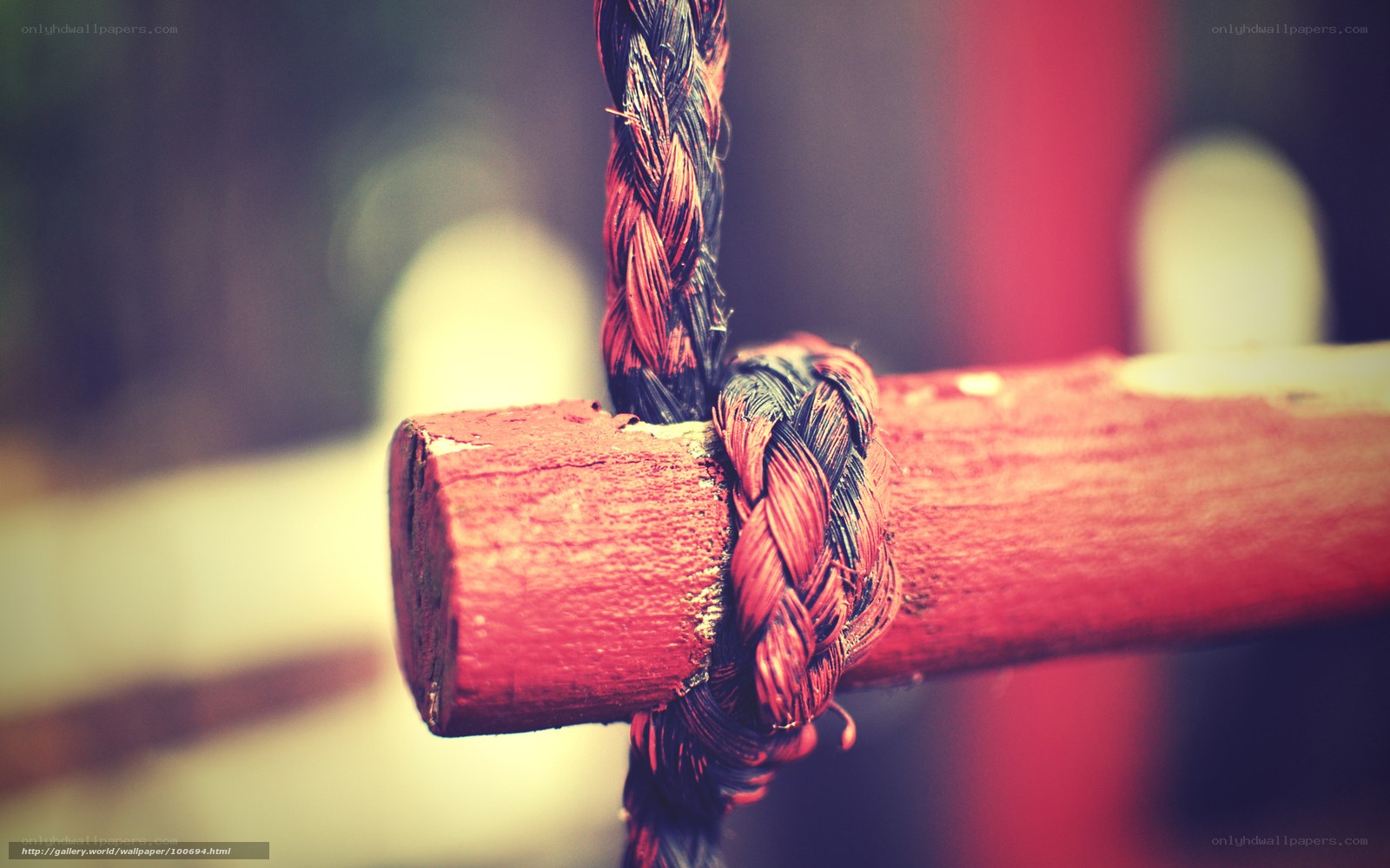 Rope tied to wooden post