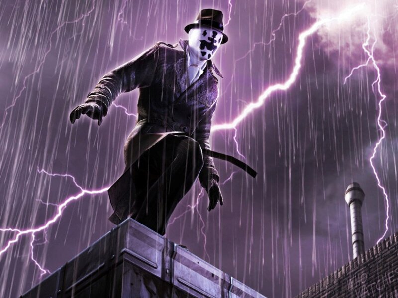 Rorschach on a rooftop in the rain