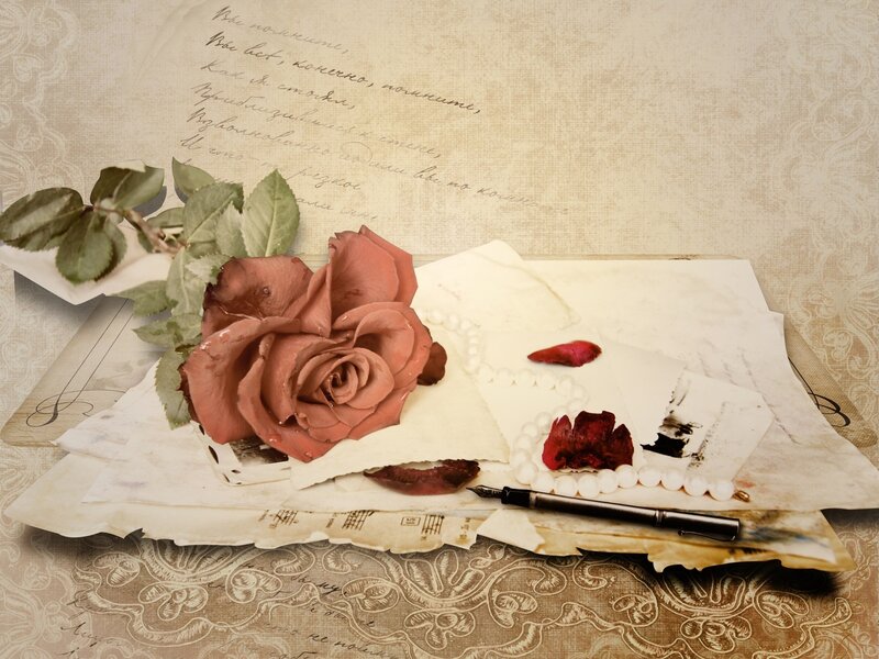 Rose and Letters on Table