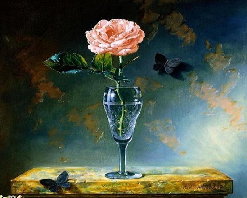 rose in a glass vase