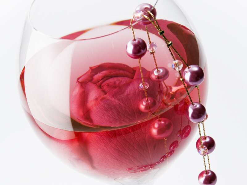 rose in wine glass