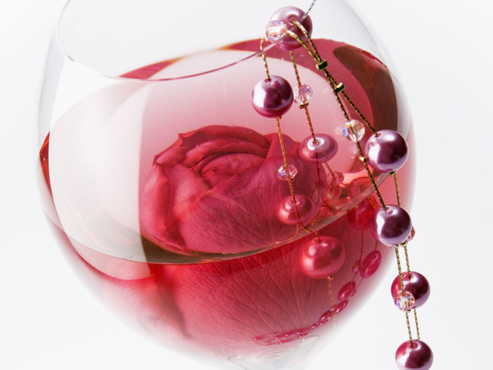 rose in wine glass