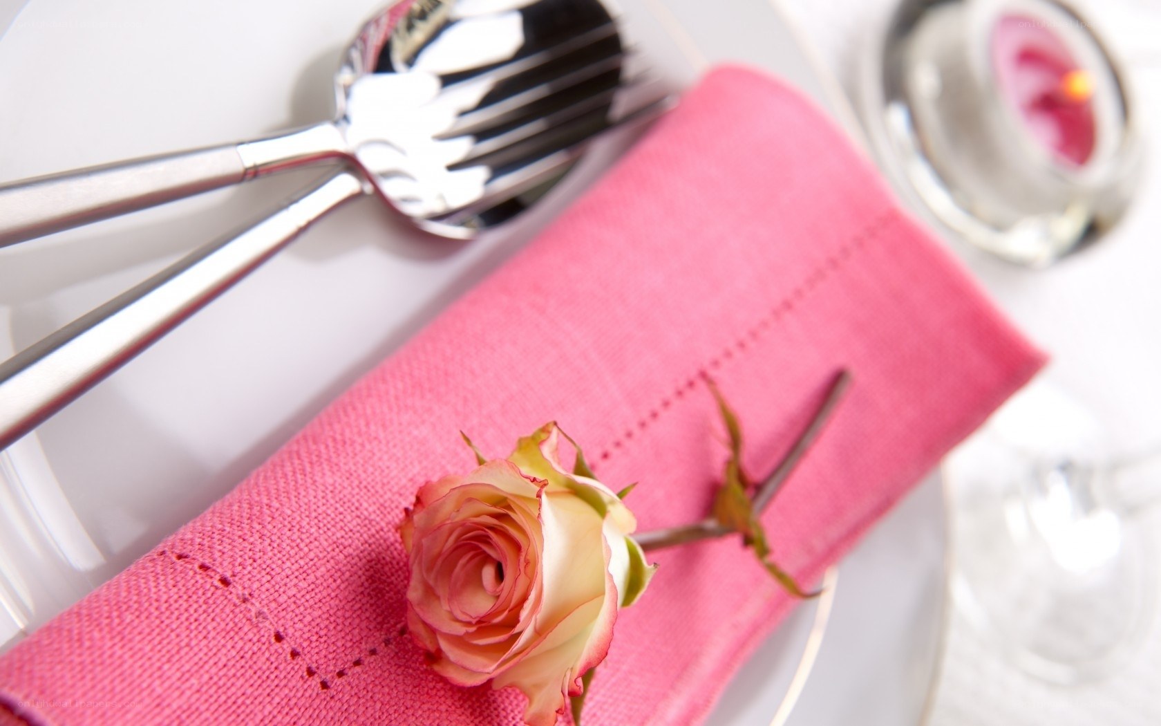 rose on pink napkin