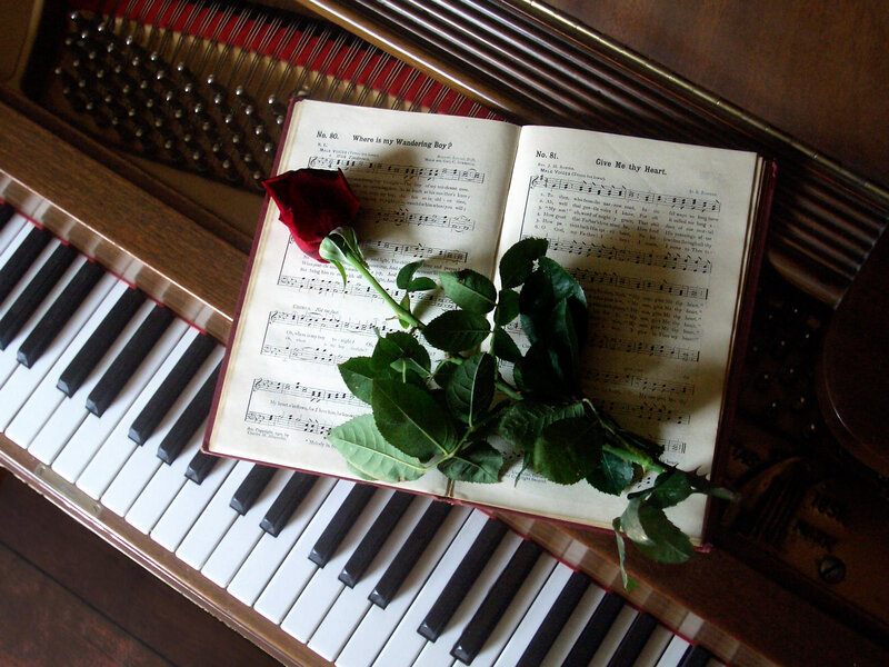Rose on Sheet Music — Brown, Serene