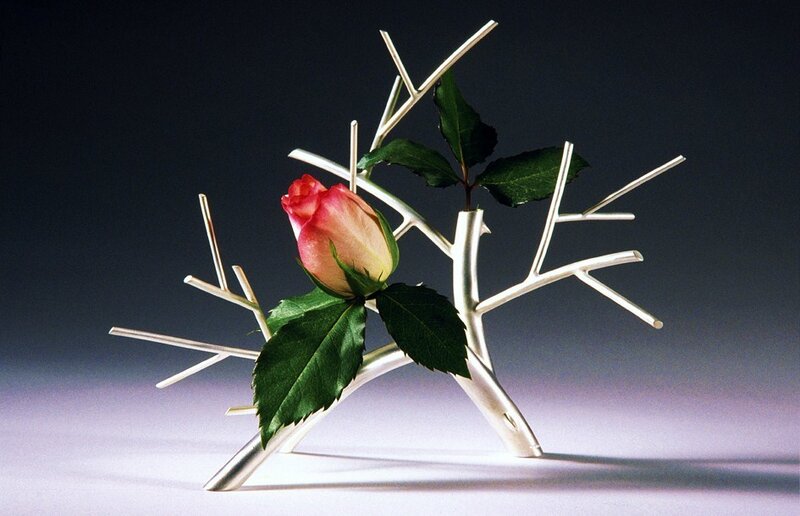 Rose on silver branch sculpture