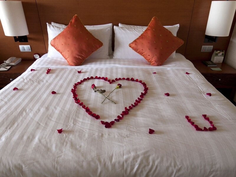 Rose Petals on Bed