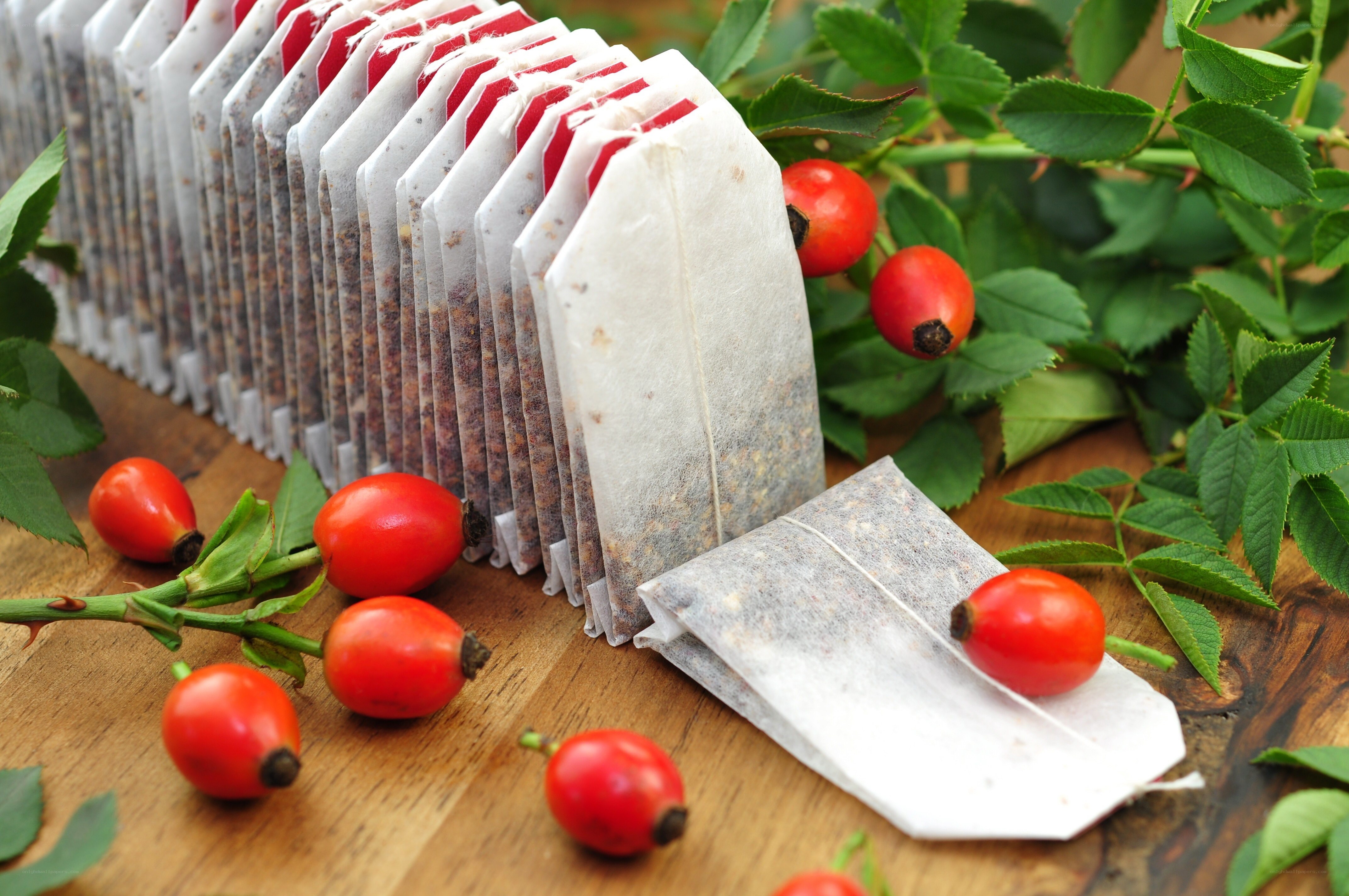 rosehip tea bags and berries