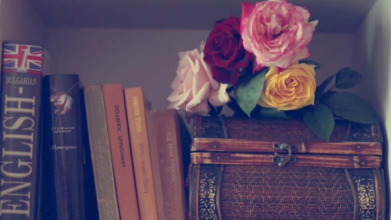 Roses and Books on Shelf