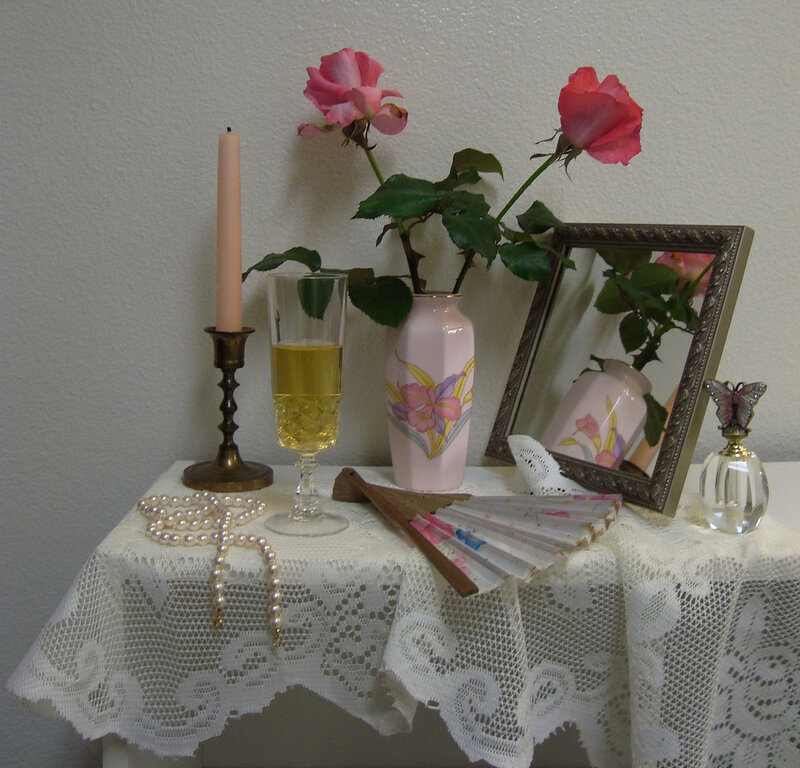 Roses and Candle on Table
