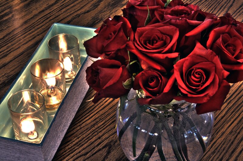 Roses and candles on a table