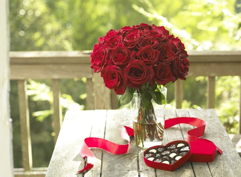 Roses and chocolates on a table