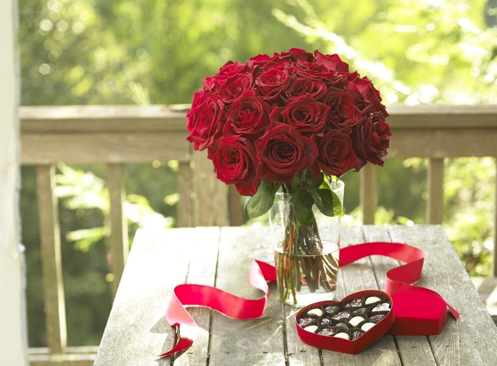Roses and chocolates on a table