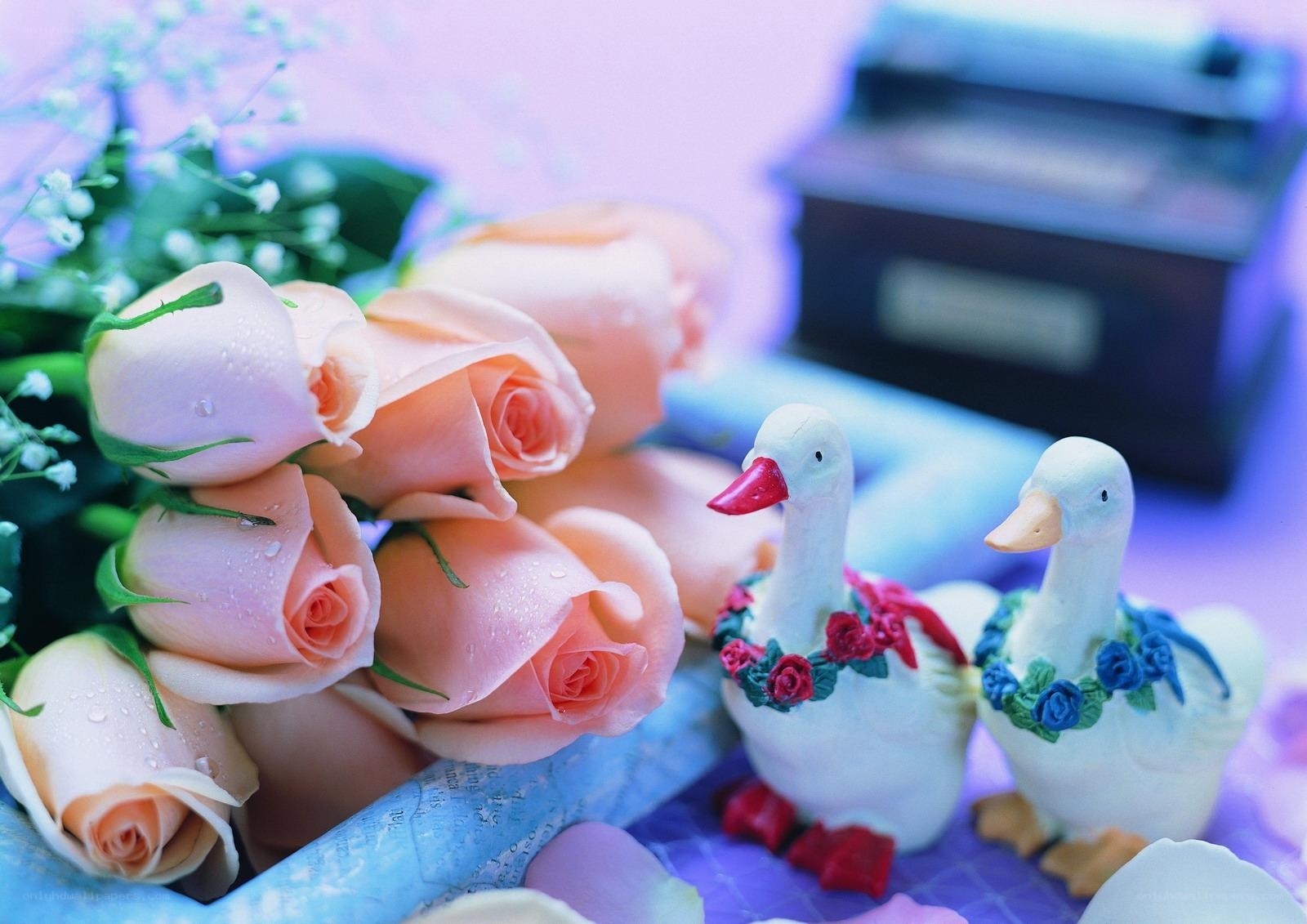 roses and duck figurines