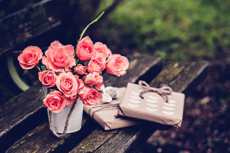 Roses and Gifts on Bench