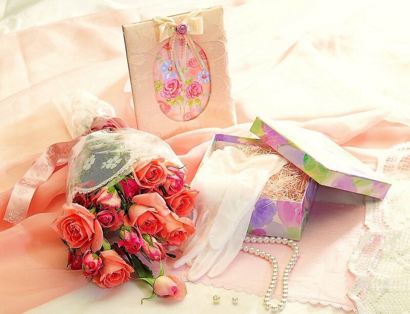 roses and gifts on fabric