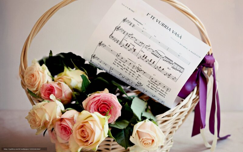 Roses and sheet music in a basket