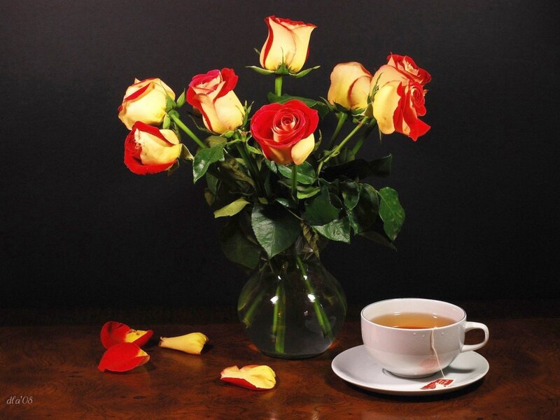Roses and tea on a table