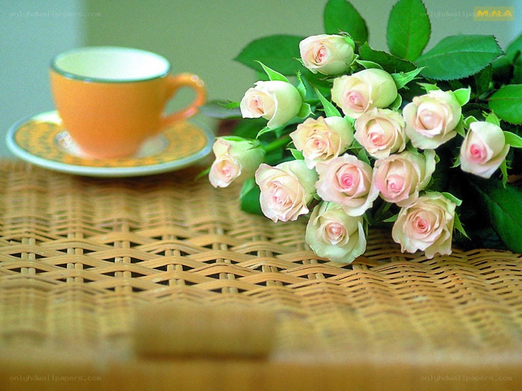 Roses and tea on wicker