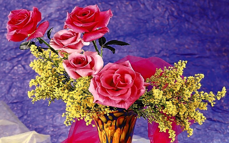 roses and yellow flowers in vase