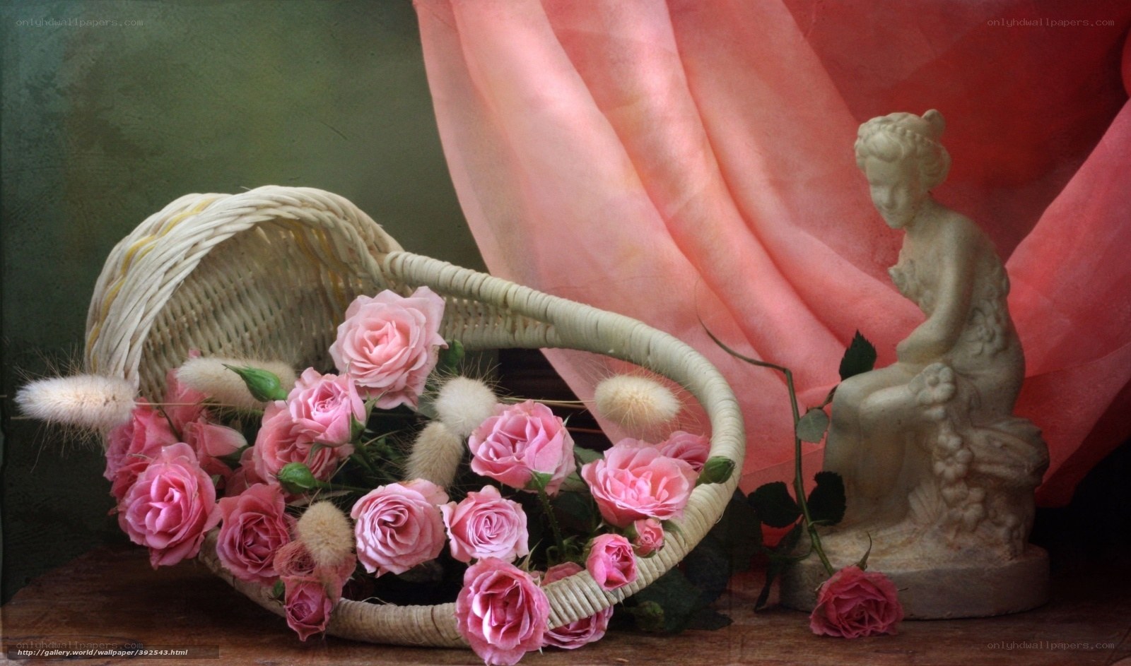 Roses in a basket with statue