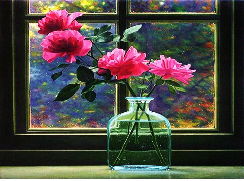 Roses in a vase by window