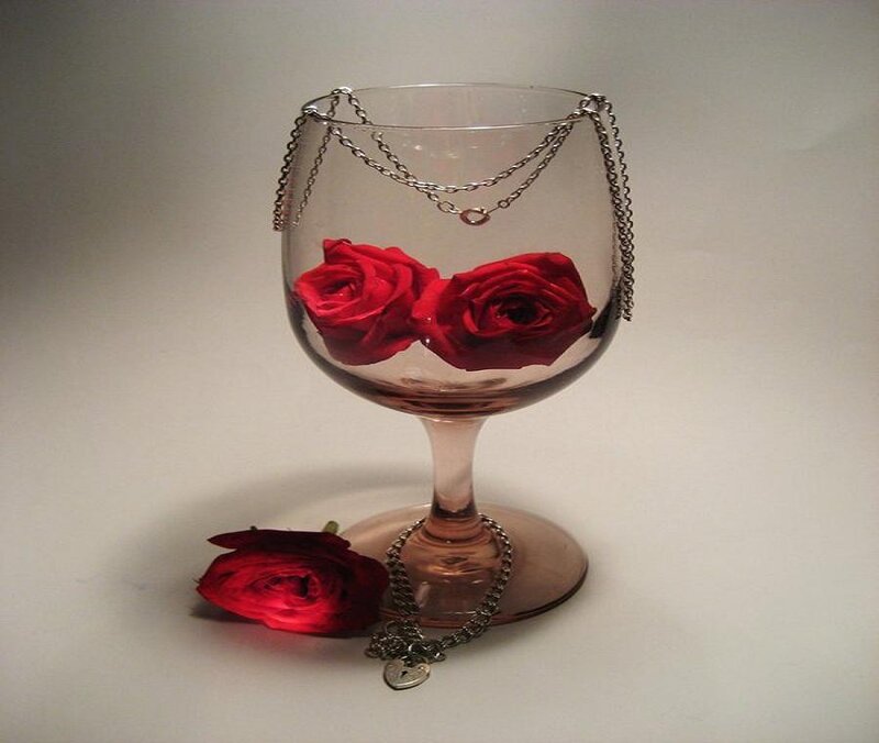 Roses in a wine glass