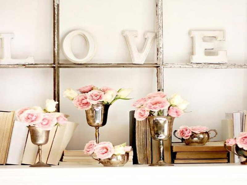 Roses in Silver Vases