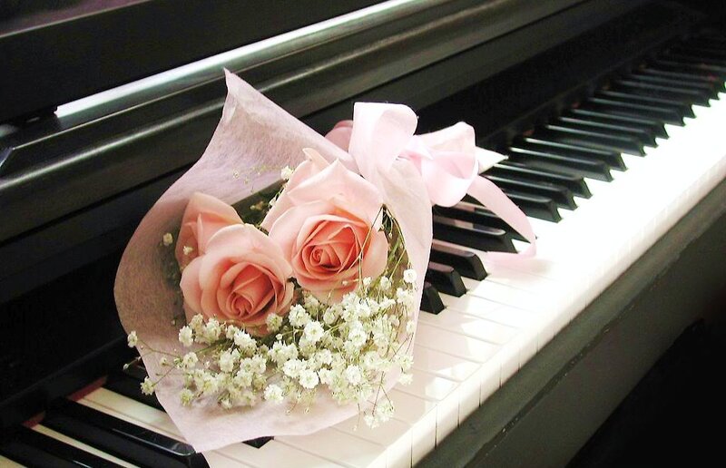 roses on piano keys