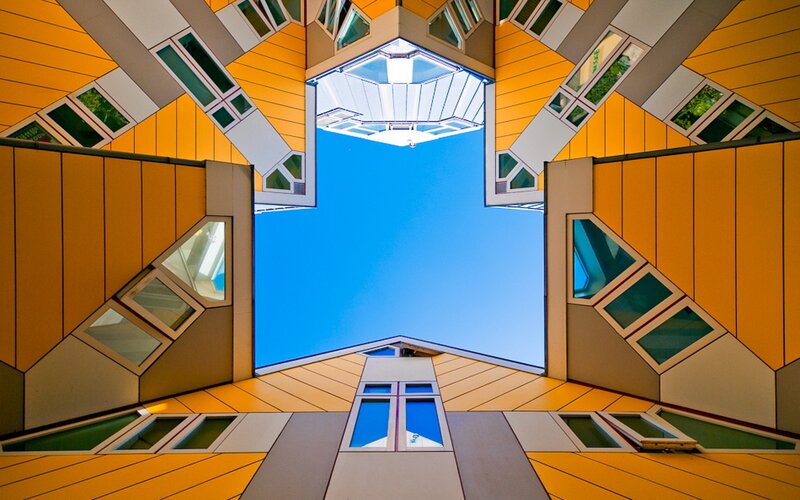 Rotating cube houses courtyard