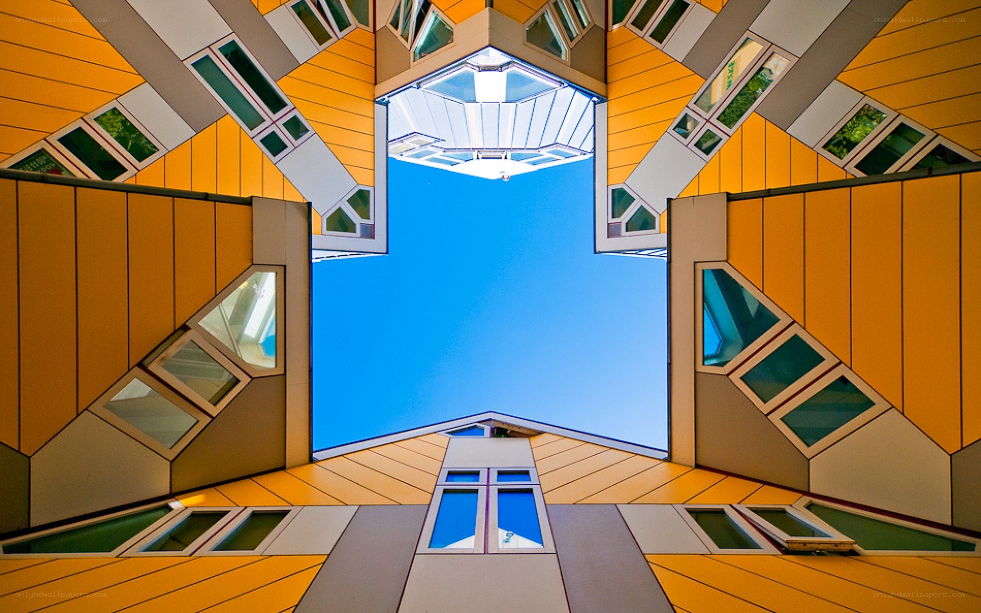 Rotating cube houses courtyard