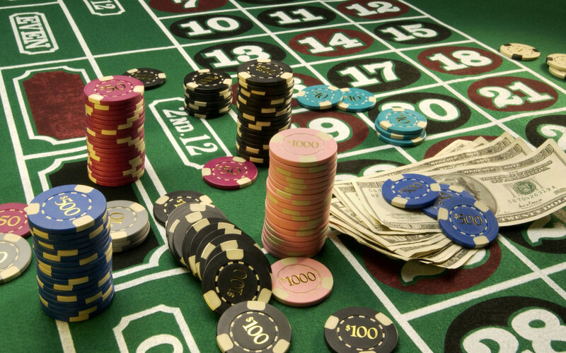 Roulette table with chips and money