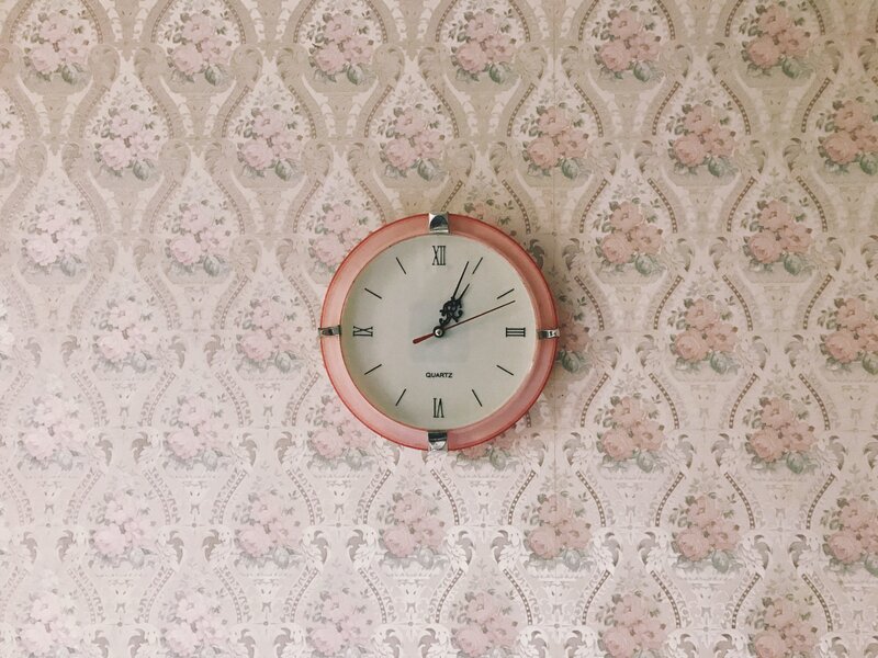 Round Clock on Wallpaper