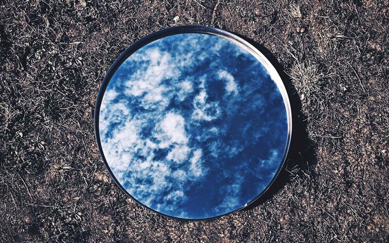 Round Mirror on Ground