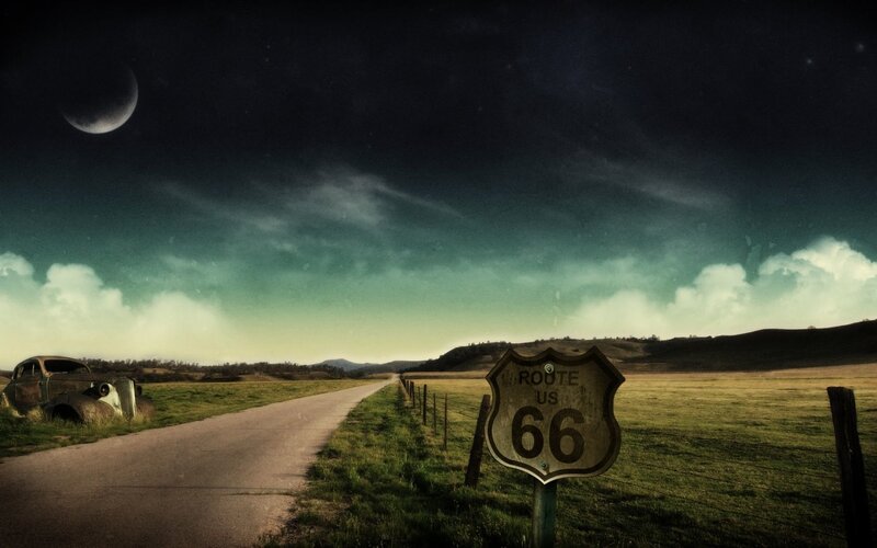 Route 66 at night with old car
