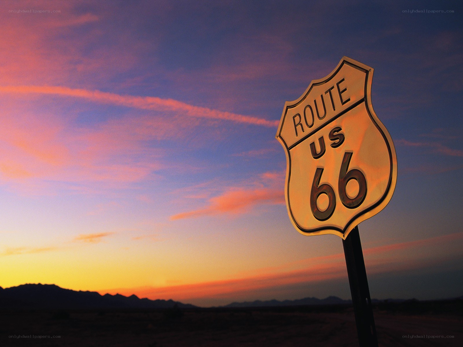 Route 66 sign at sunset