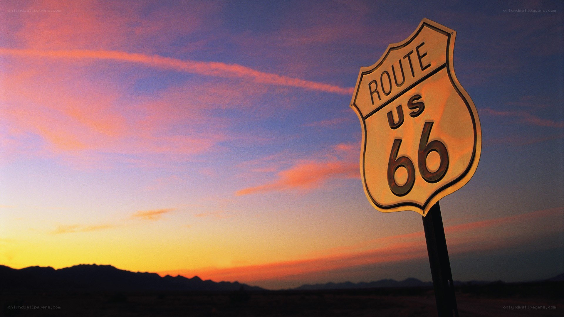 Route 66 sign at sunset