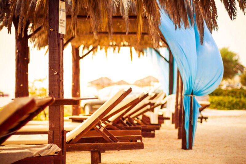 Row of Beach Lounge Chairs