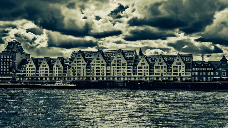 Row of Buildings by River
