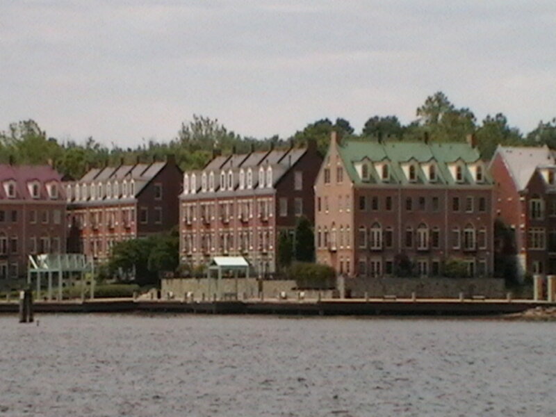 row of buildings by the water