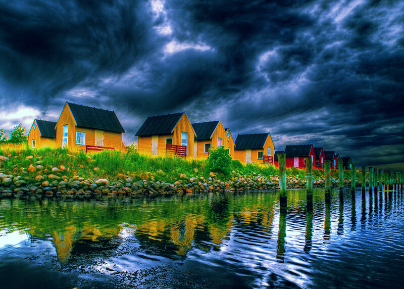 Row of Cabins by Water