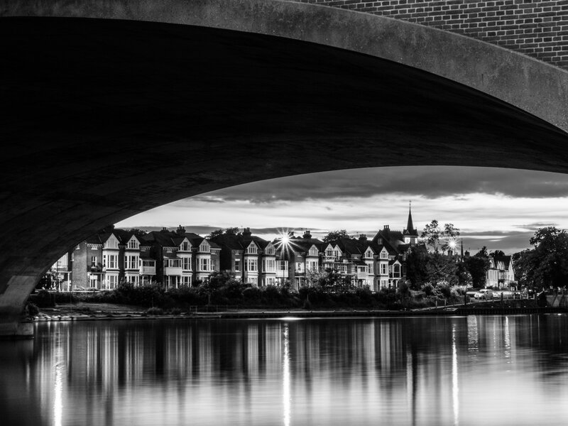 Row of Houses under Bridge