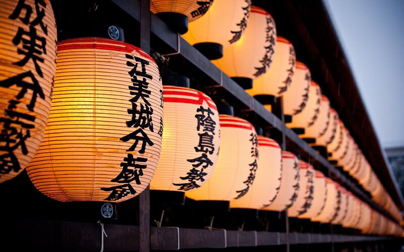 Row of illuminated paper lanterns